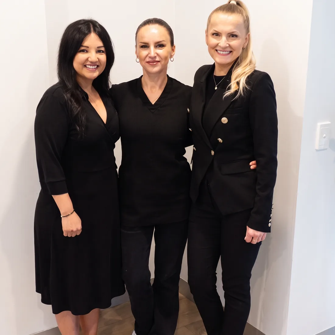Three members of the neoSKiN team at the clinic